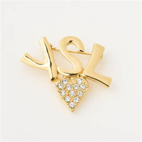 ysl brož|ysl brooches and rings.